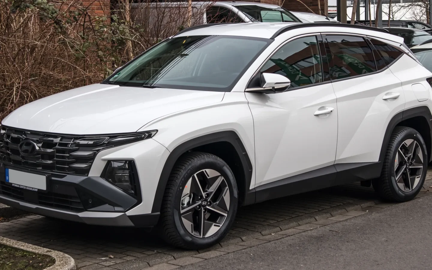 Hyundai TUCSON Plug-in Hybrid blanc vu de trois quarts avant