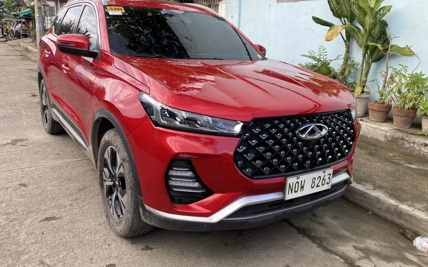 Chery Tiggo 7 Pro Hybrid gris vu de trois quarts avant ; configuration étrangère non contractuelle